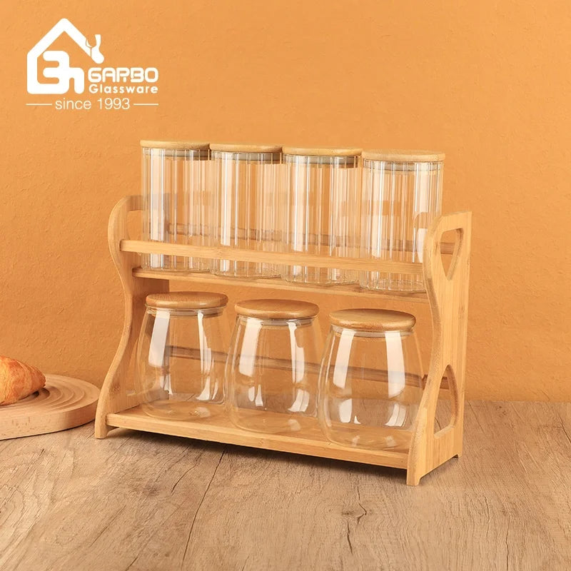 China Supplier High Borosilicate Glass Jars for  Kitchen or Home Storage Bottle Sets  with Bamboo Lids and Stand Customized