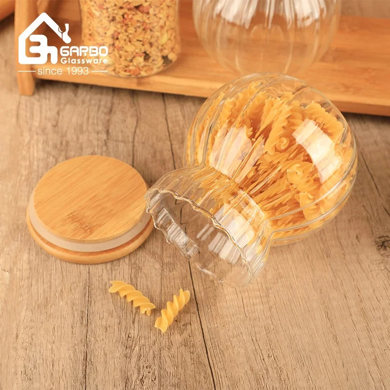 China Supplier High Borosilicate Glass Jars for  Kitchen or Home Storage Bottle Sets  with Bamboo Lids and Stand Customized