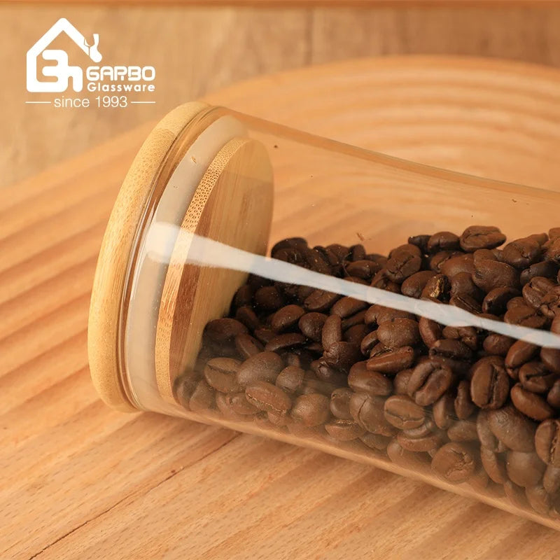 China Supplier High Borosilicate Glass Jars for  Kitchen or Home Storage Bottle Sets  with Bamboo Lids and Stand Customized